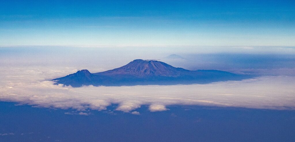 kilimanjaro, mountain, mount kilimanjaro, volcano, africa, tanzania, safari, serengeti, nature, bird's eye view, landscape, horizon, sea of clouds, kilimanjaro, kilimanjaro, kilimanjaro, mount kilimanjaro, mount kilimanjaro, mount kilimanjaro, mount kilimanjaro, mount kilimanjaro